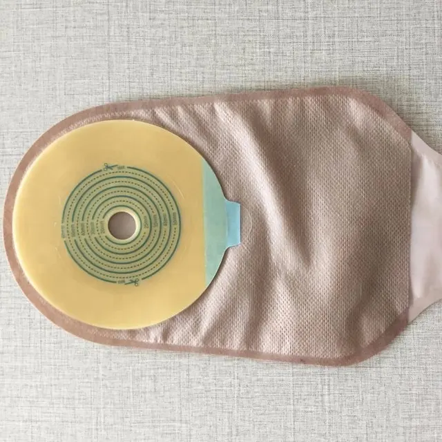 One piece open type colostomy bag with clip